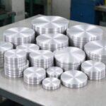 Cookware-grade aluminum circles ready for deep drawing.