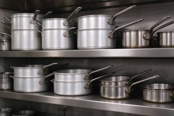 Stockpots and saucepans deep-drawn from heavy circles.